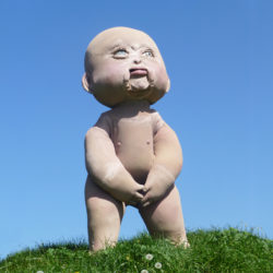 Baby puppet on hill