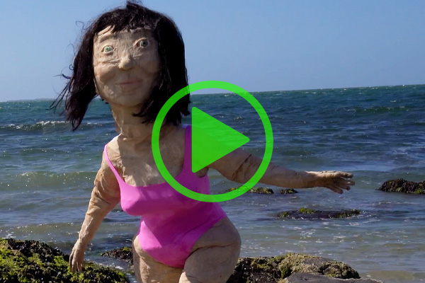 Mother puppet at the beach